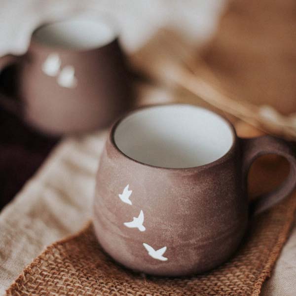 Birds in flight handmade Ceramic Mug by Canadian pottery studio Discovery Ceramics