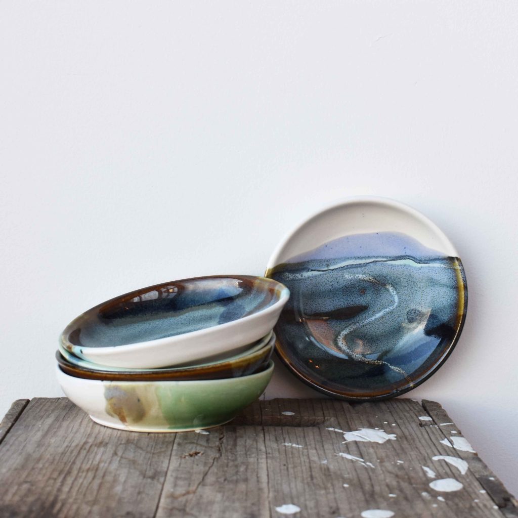 Bronwyn Arundel landscape pottery bowls and dishes handcrafted in white clay with blue and green finishes