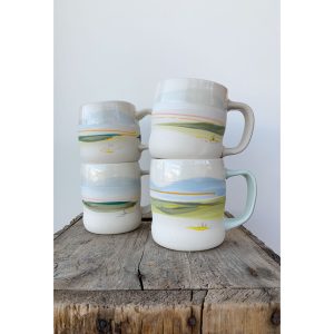 Juliana Rempel's prairie mug - ceramic art with multiple coloured handles - blue, brown, pink, yellow, green, clear