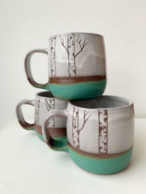 Juliana Rempel's aspen mugs new with tree design at bottom of the mug