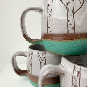 Juliana Rempel's aspen mugs new with tree design at bottom of the mug