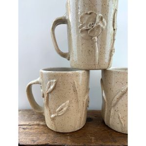 Nana Ann 3D sculpted mugs with cream speckled clay by Juliana Rempel