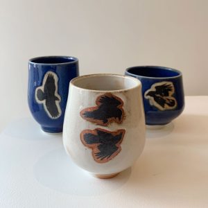 Raven sippers by Topo Pots at h squared gallery in downtown Fernie, BC, Canada - Canadian potters, ceramic artists, and more