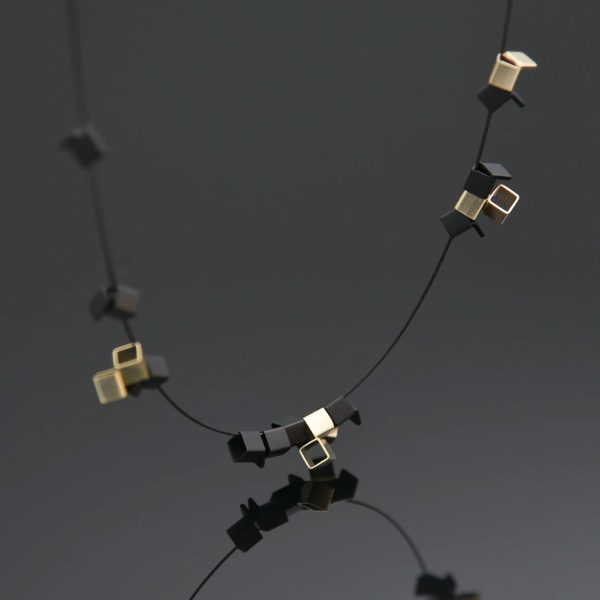 codex necklace in black and gold, small cube, minimalist jewellery by Pursuits in Toronto, ON, Canada