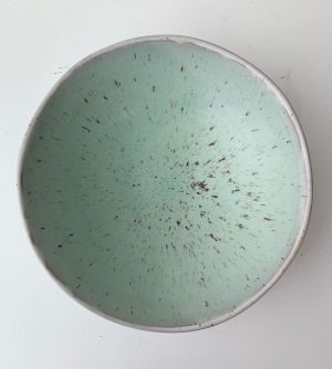Eryn Prospero's large serving bowls in speckled white finish and turquoise or light mint green glaze