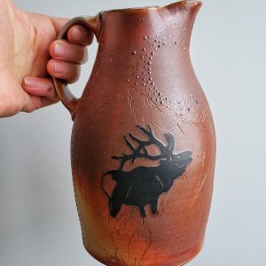 Katy Drijber elk pitcher is warm copper colours - ceramic art that's functional
