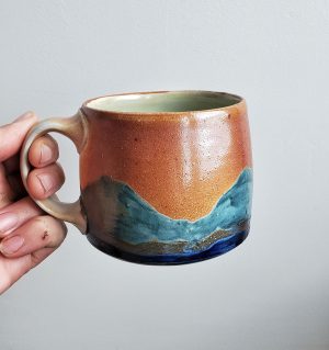 Katy Drijber mountain mug is warm and cool colours - ceramic art functional