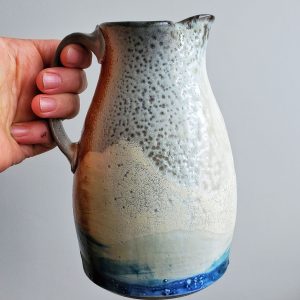 Snowstorm Pitcher by Katy Drijber, creative ceramic artist with mountains and snowstorm