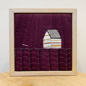 Sam Sedlowsky quilt fibre artist in Fernie, BC - Lilac Fields - cabin in the woods