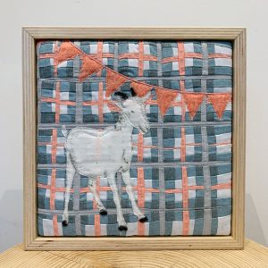 Party Animal, quilt art by fabric artist Sam Sedlowsky from Fernie, BC Canada - goat at a party