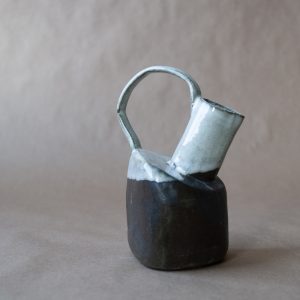 Steve Cho - This and That ceramic pottery artist pot with spout and handle contrasting white and black