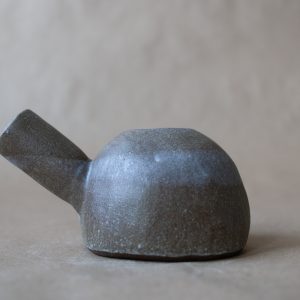 black clay spouted vessel or tiny watering pot by this and that studio Steve Cho at h squared gallery