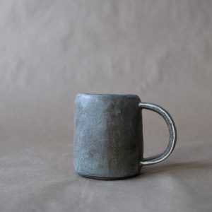 black clay mug by this and that studio in fernie, BC minimalist crafted ceramics
