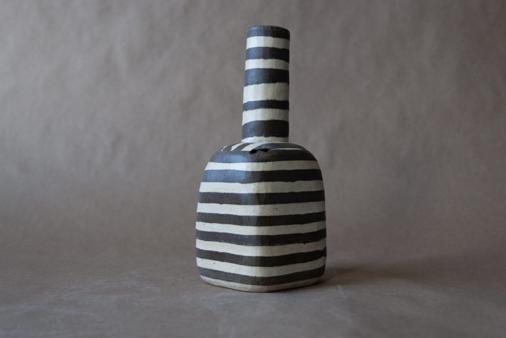 black and white striped vase by ceramic artist this and that studio Steve Cho in Fernie, BC