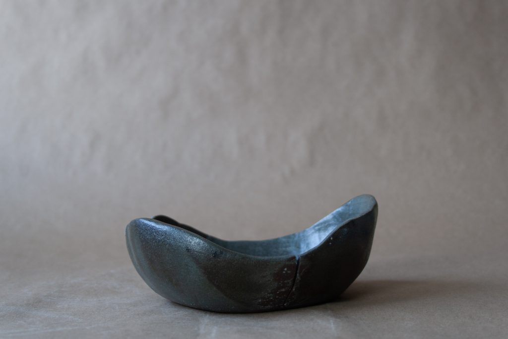 black clay ceramic bowl built by this and that studio Steve Cho in Fernie, BC