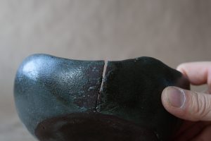 black clay ceramic bowl built by this and that studio Steve Cho in Fernie, BC