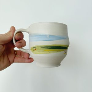 Juliana Rempel's new prairie mugs with a bubbly shape and the original prairie landscape design by Juliana Rempel