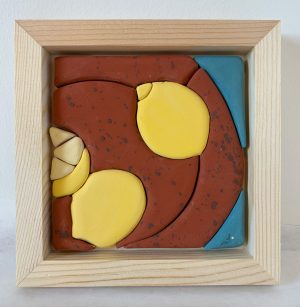 ceramic tile art, framed in a light wood frame, by Juliana Rempel, Canadian ceramic artist from Bragg Creek Alberta