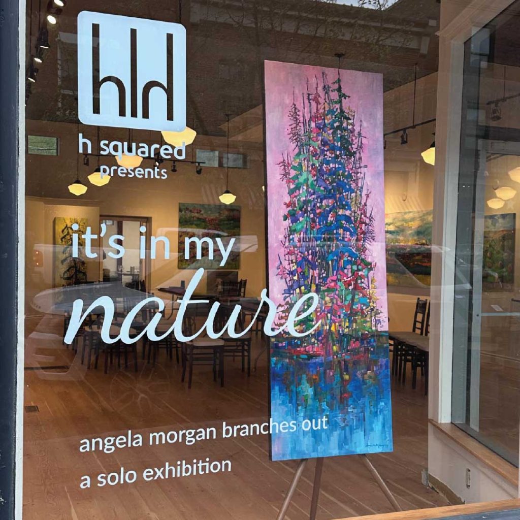 a window display of the art exhibit it's in my nature