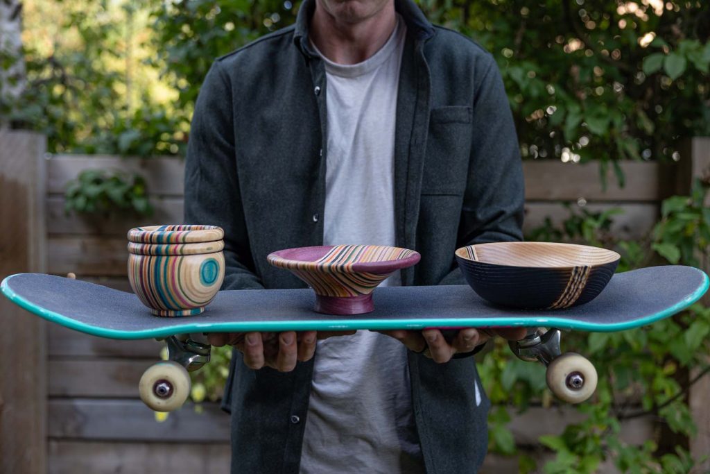Closeup of Brad of Blackburl works with Upcycled pieces on a skateboard